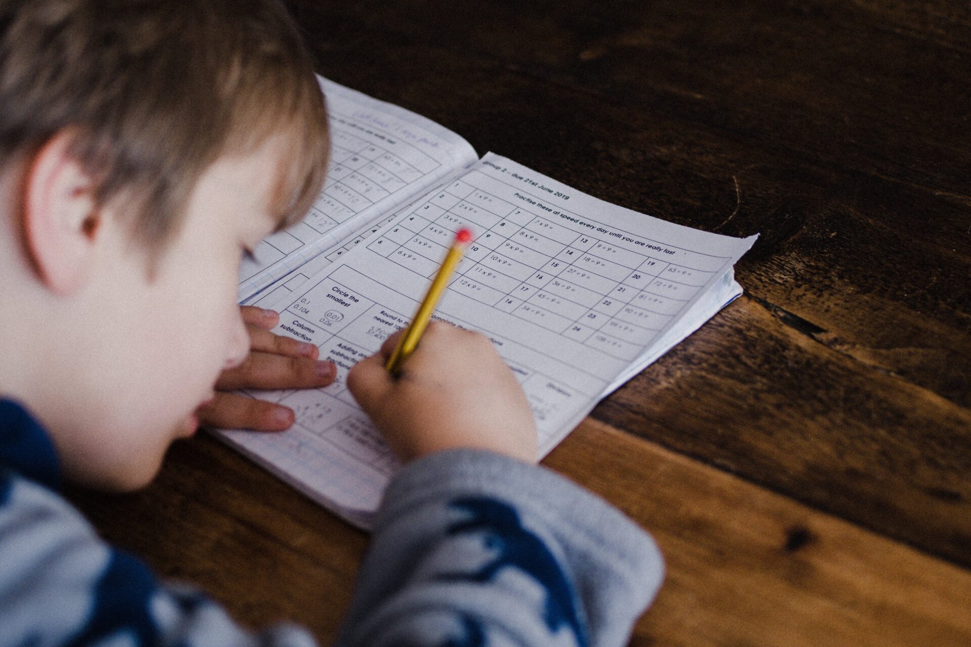 a boy studying the mathematics